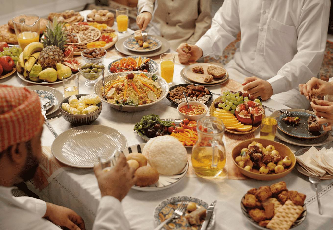 muslim friends enjoying an Eid feast. 