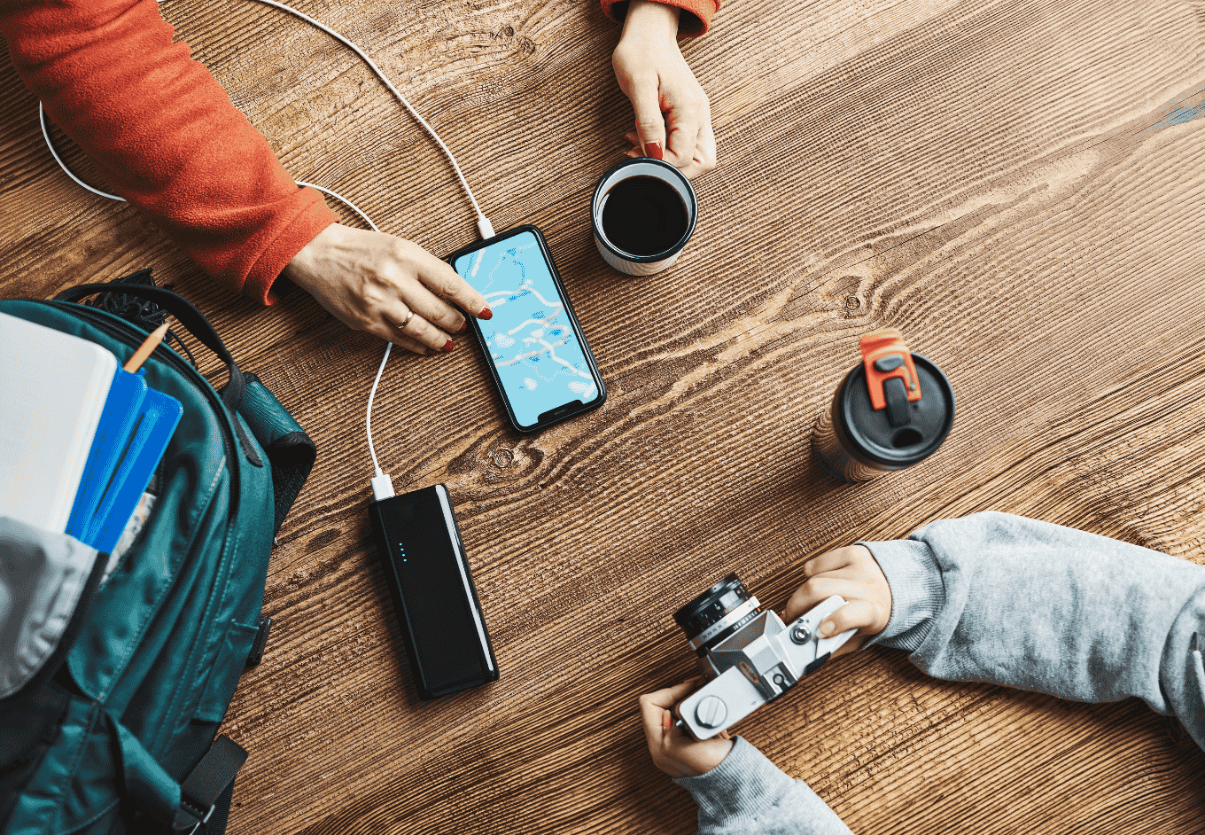 Charging Mobile Phone With Backpack and Camera