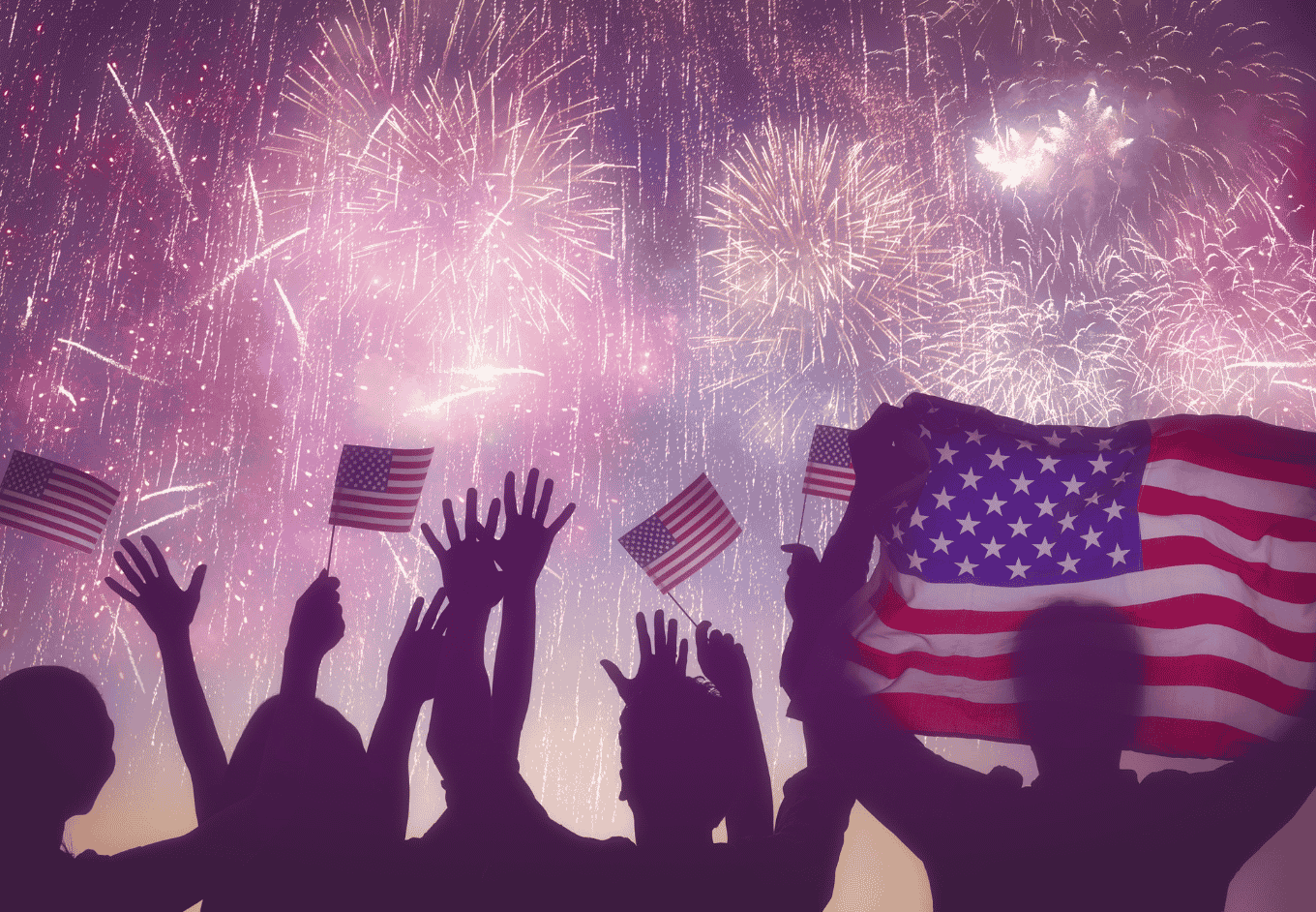 Silhouettes Celebrating with Fireworks and American Flags