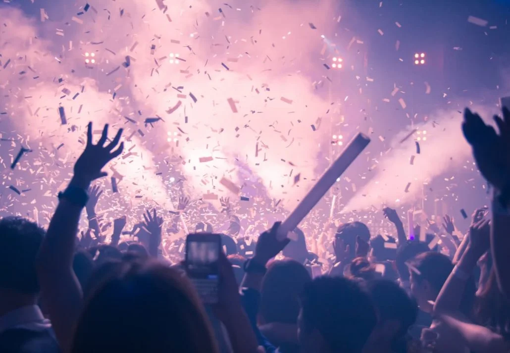 Young crowd partying at a nighclub.
