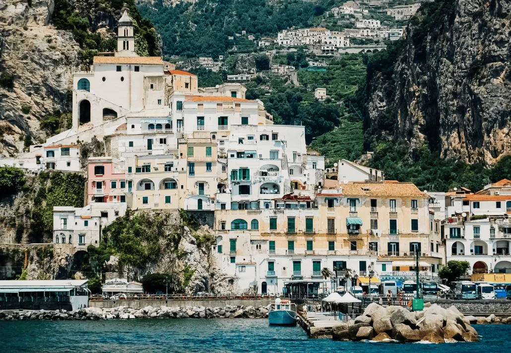 ld and colorful houses built on the side of a hill in Sorrento