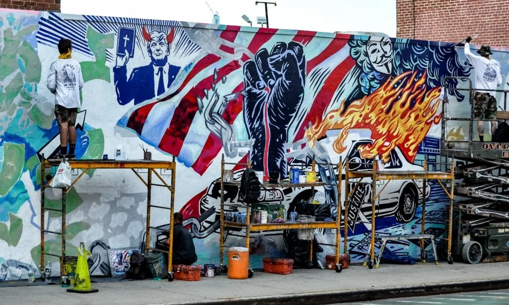 Wall art in New York City illustrating American politics and anti-Trump sentiments 