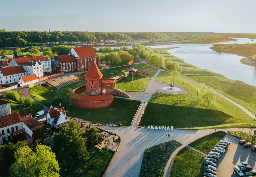 underrated european cities without crowds Aerial shot of Kaunas castle and beautiful landscape on a sunny day in Lithuania