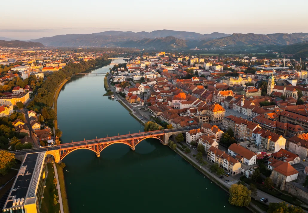 City of Maribor in Slovenia illuminated by rising sun in the summer morning