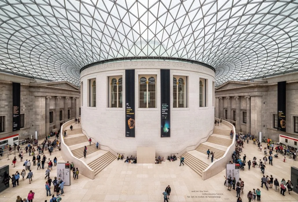 London Attractions - Tourists in the Great Court at the British Museum, in London.