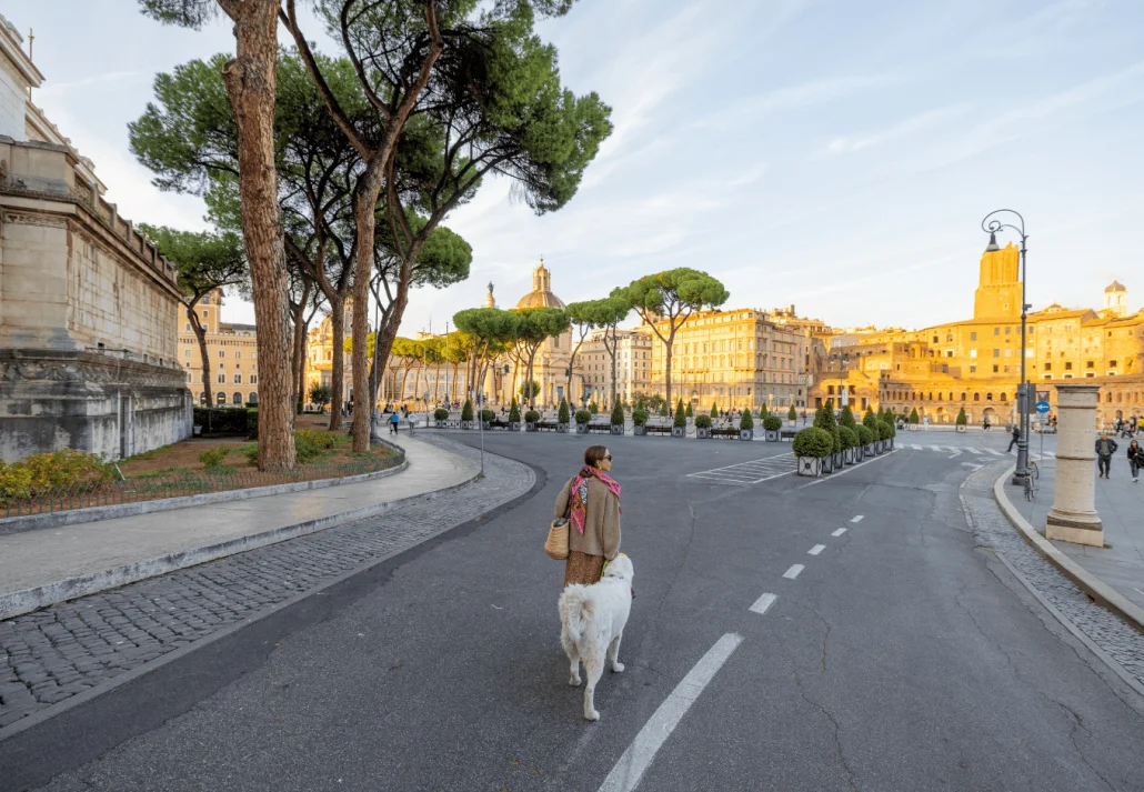  Woman walking with a dog at Viale Vespucci, Rimini Riviera