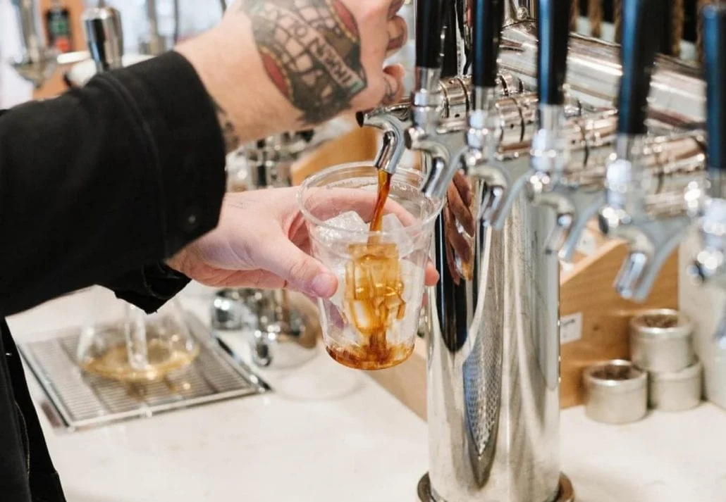Barista making coffee at Loyal Coffee, Colorado.