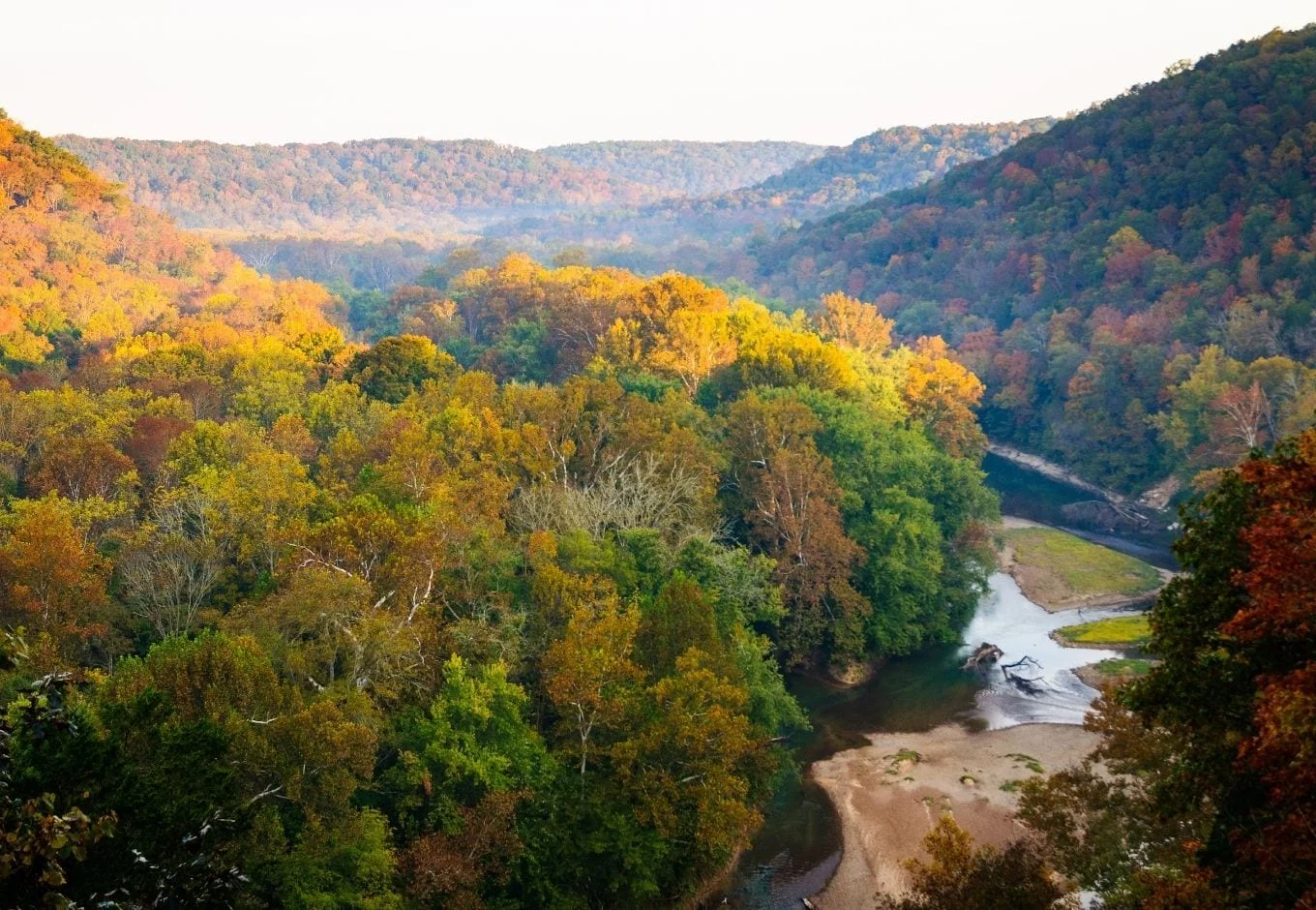 Aerial view of the orange and yellow fall trees at the Mammoth Cave National Park.