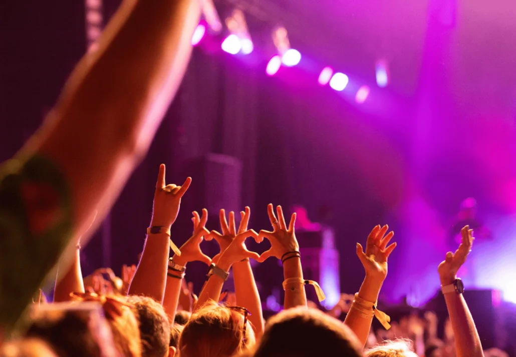 crowd partying stage lights live concert summer music festival