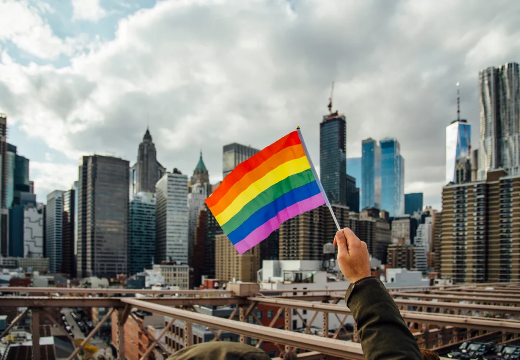 Gay flag with New York in the background, USA